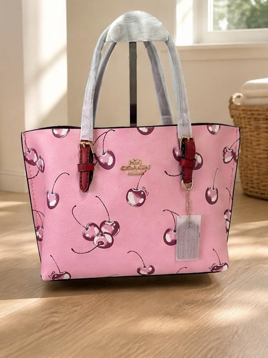 Coach Handbags - Coach Pink Cherry-Print Tote with Red Trim